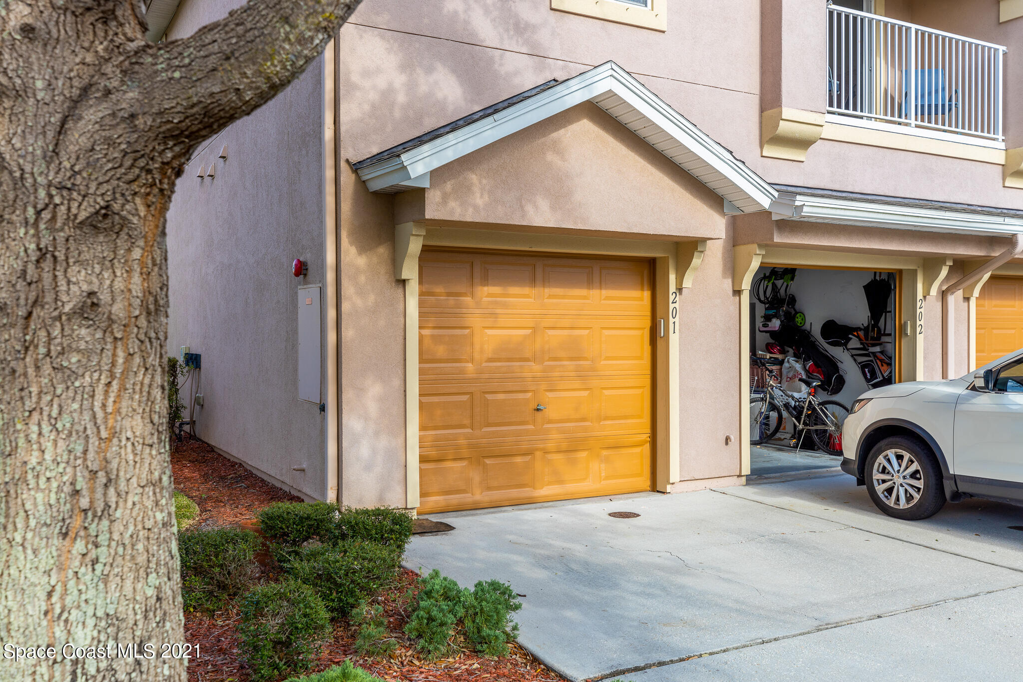 4056 Meander Place, Unit 201 Rockledge, FL 32955 - Photo 21 of 27 a car parked in front of a house
