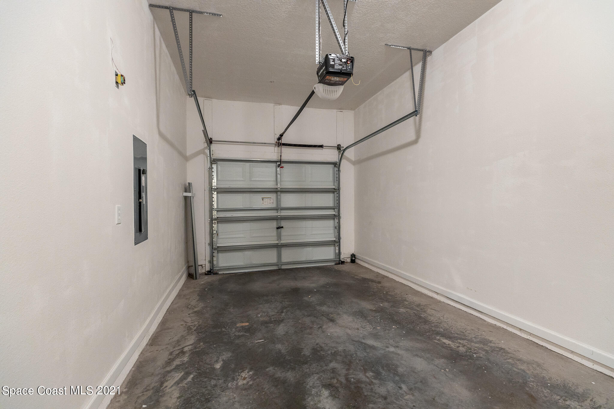 4056 Meander Place, Unit 201 Rockledge, FL 32955 - Photo 24 of 27 a view of room with stairs and a window