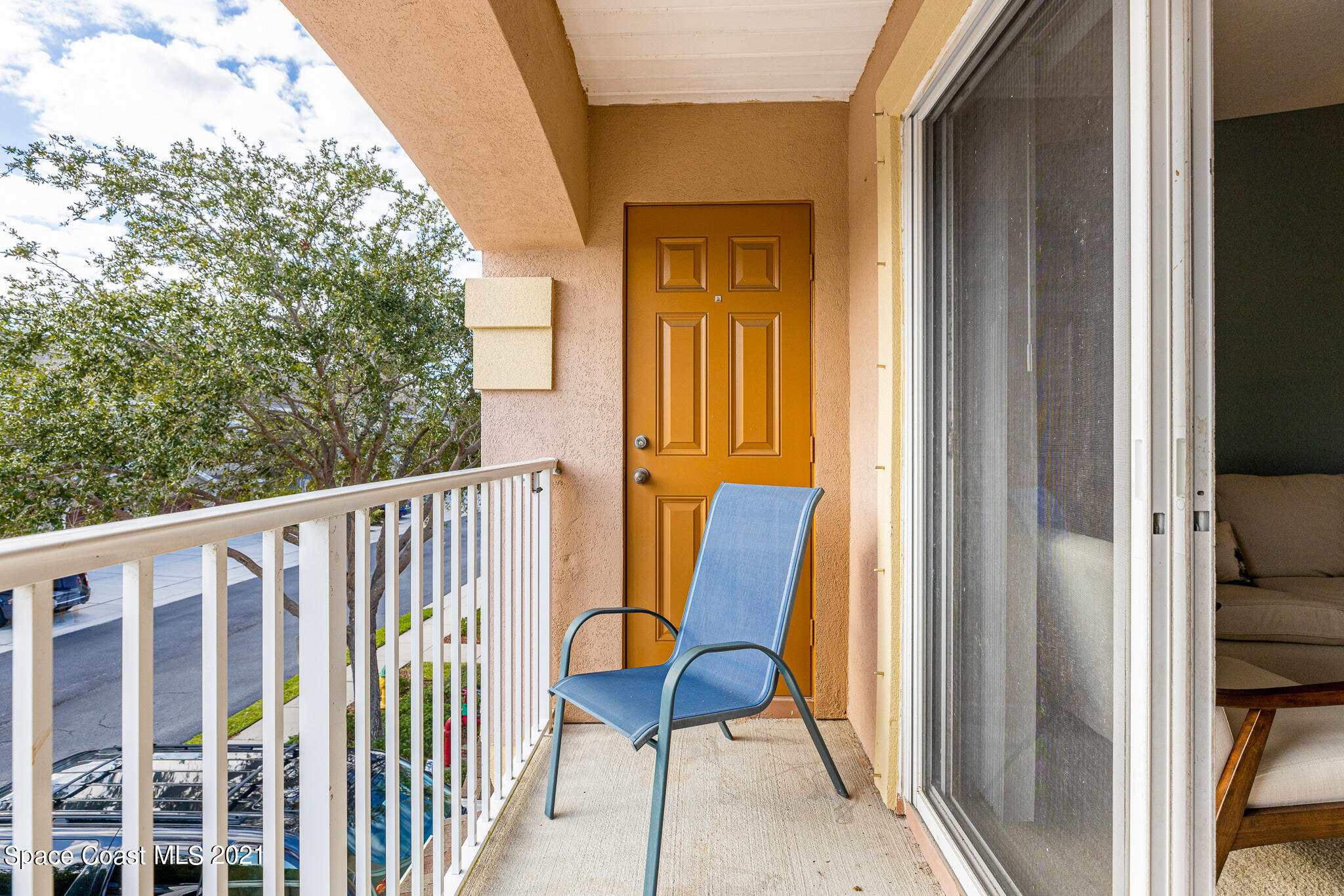 4056 Meander Place, Unit 201 Rockledge, FL 32955 - Photo 25 of 27 a view of a chair in the balcony