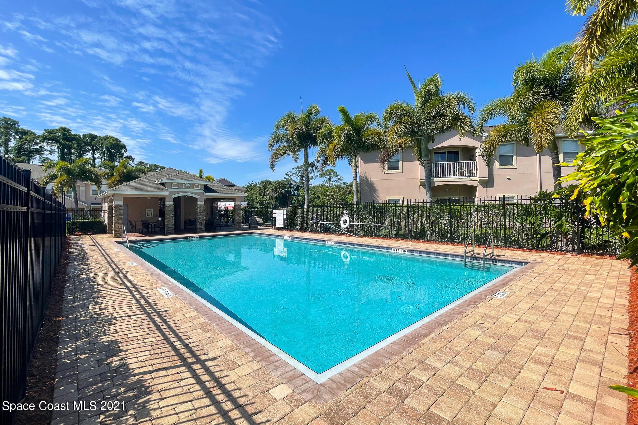 4056 Meander Place, Unit 201 Rockledge, FL 32955 - Photo 27 of 27 a view of a house with swimming pool