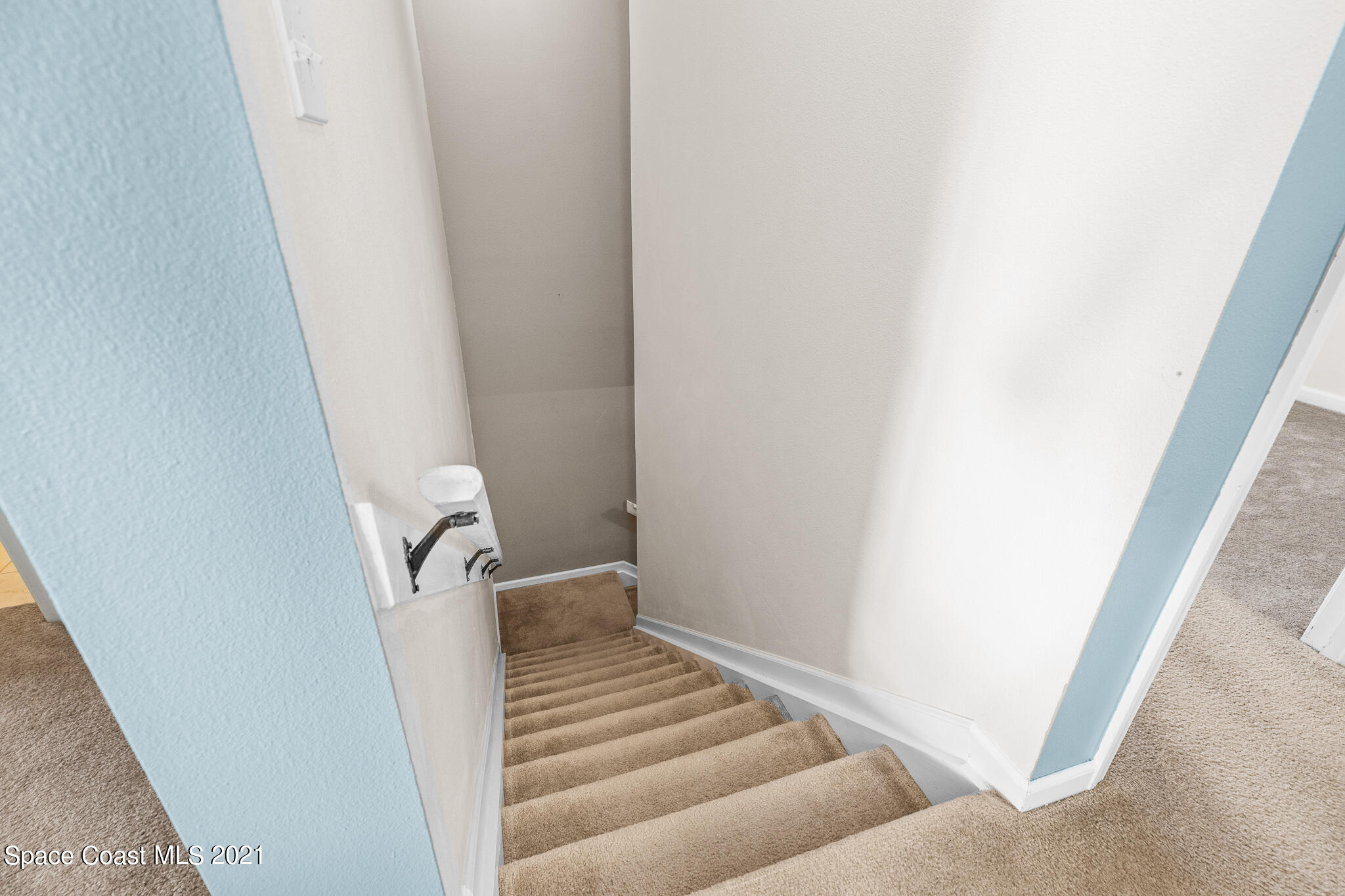 4056 Meander Place, Unit 201 Rockledge, FL 32955 - Photo 5 of 27 a view of a hallway