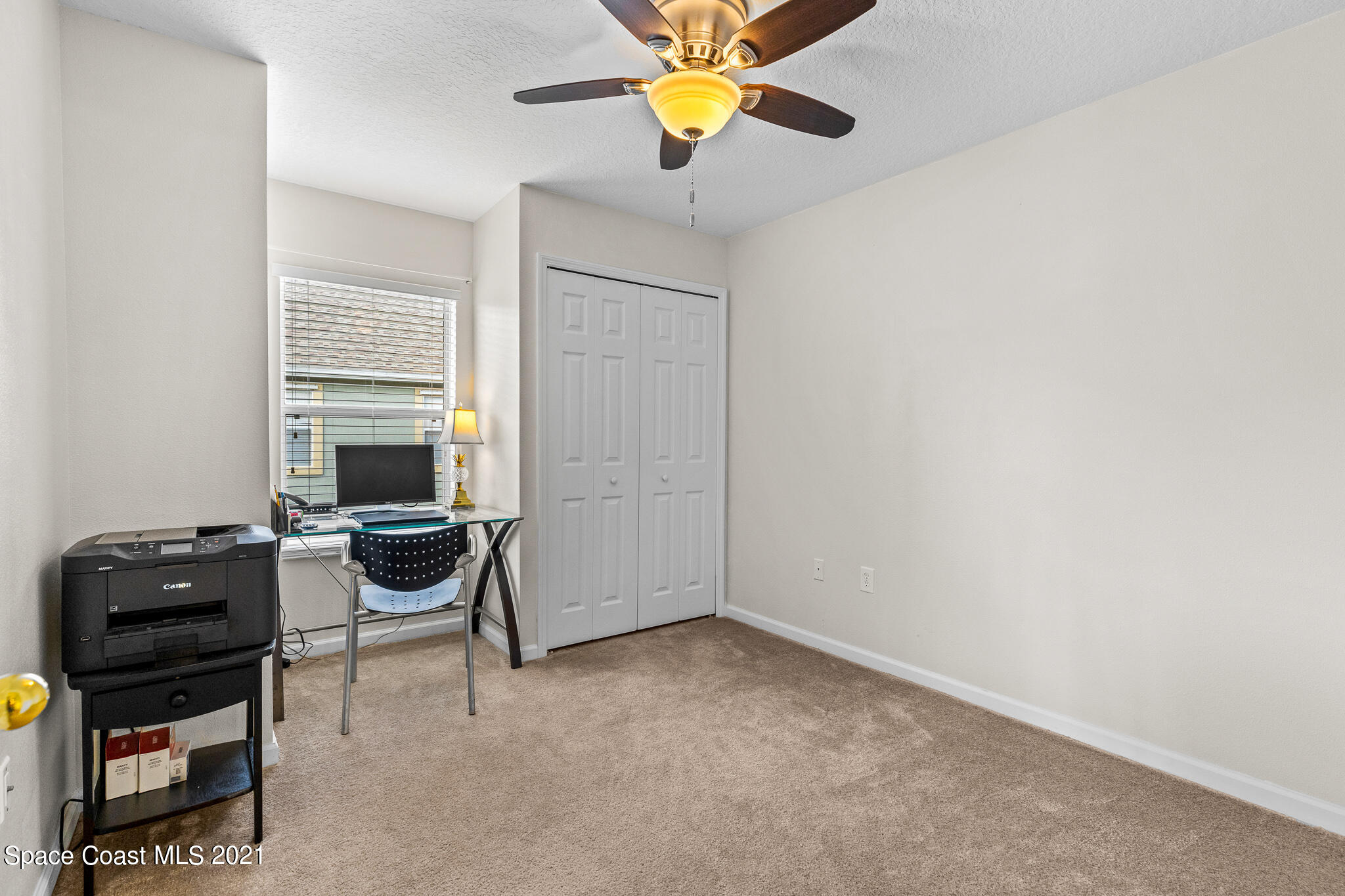 4056 Meander Place, Unit 201 Rockledge, FL 32955 - Photo 9 of 27 a view of a workspace with furniture