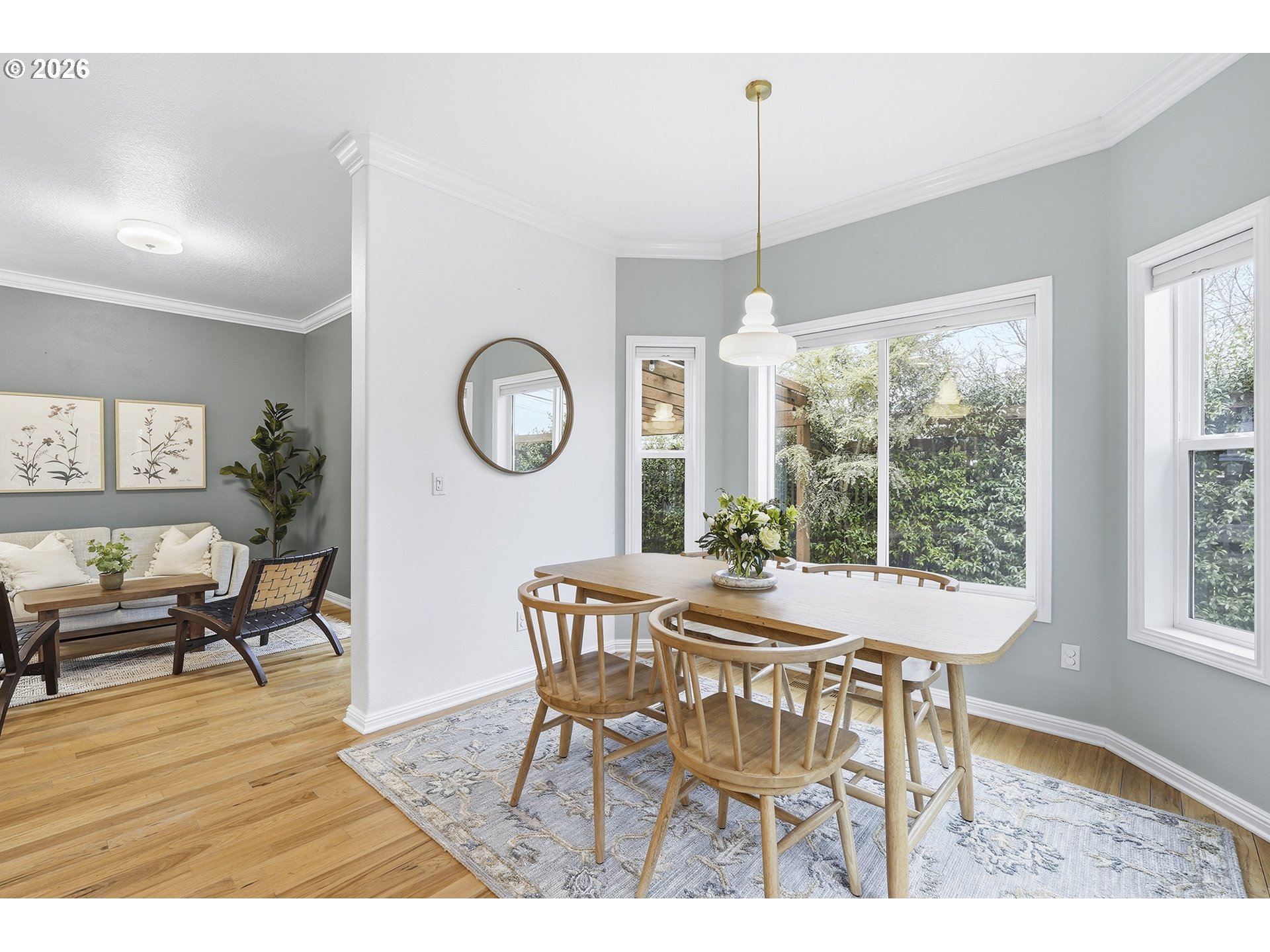 3307 North Terry Street Portland, OR 97217 - Photo 13 of 37 a view of a dining room with furniture window and wooden floor