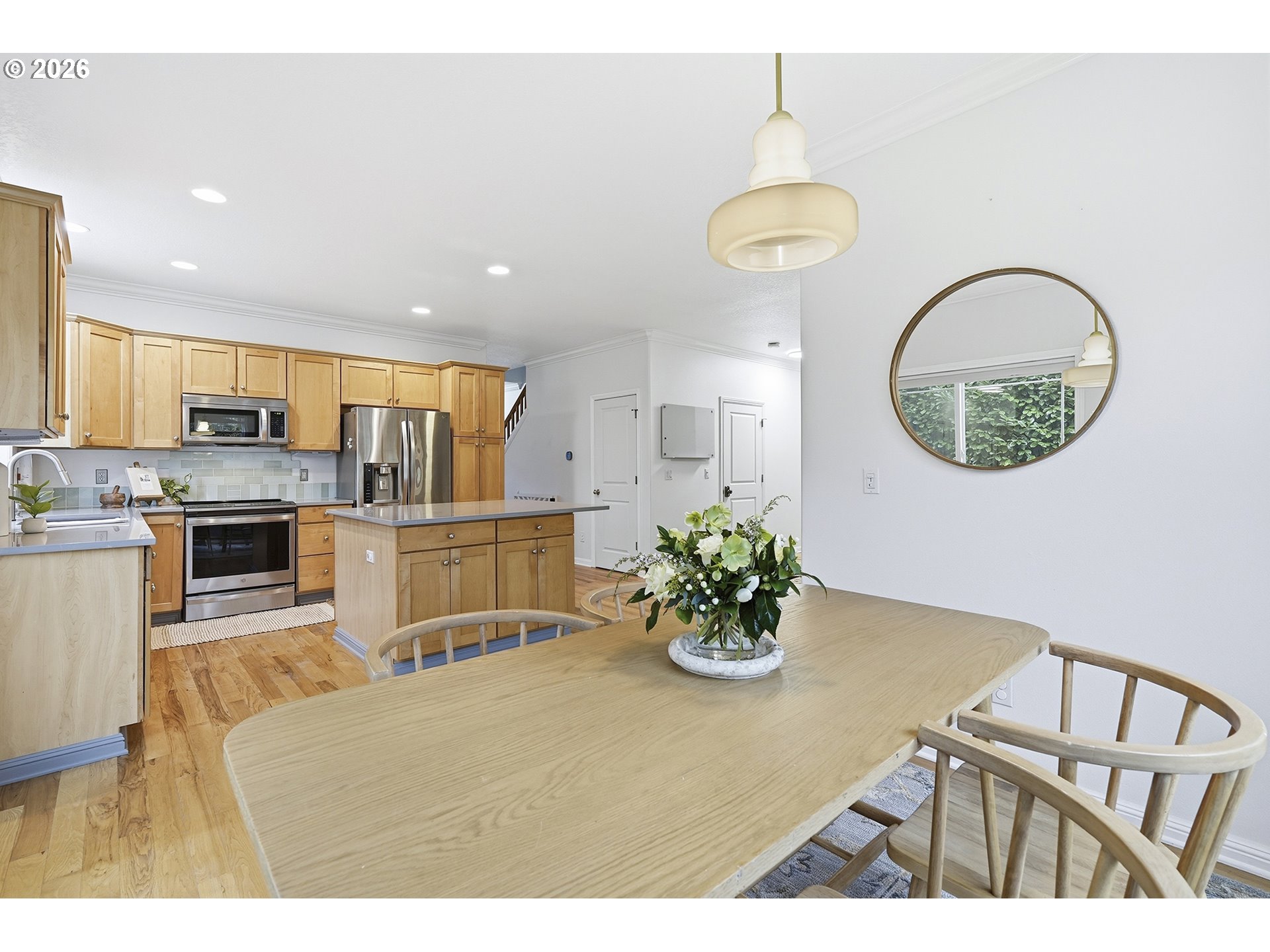 3307 North Terry Street Portland, OR 97217 - Photo 14 of 37 a living room with stainless steel appliances kitchen island a table and chairs