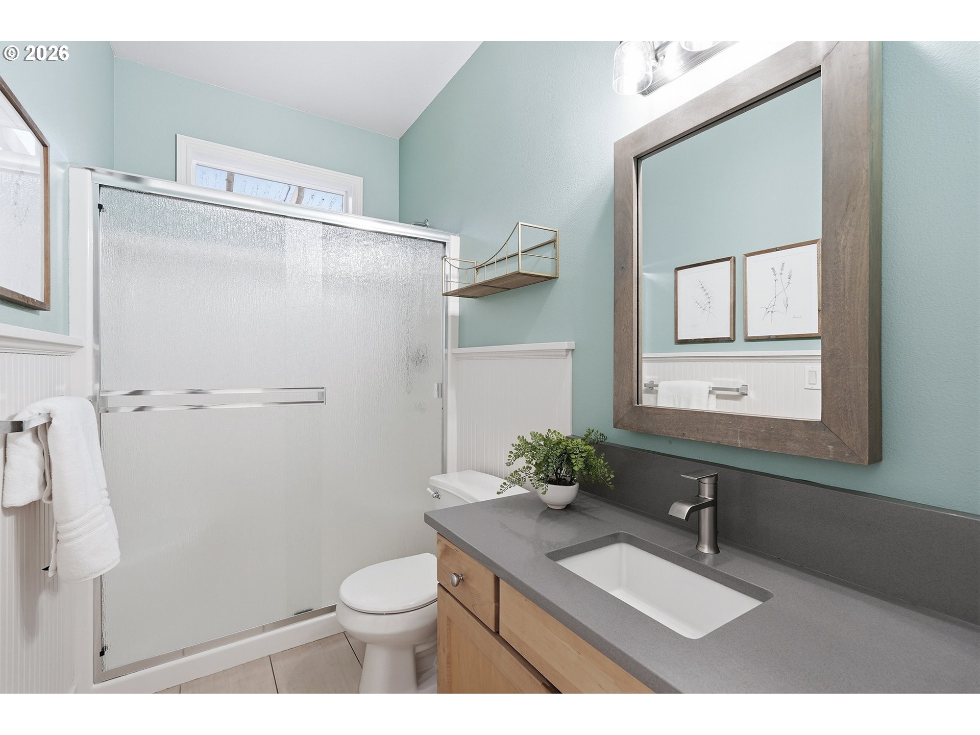 3307 North Terry Street Portland, OR 97217 - Photo 21 of 37 a bathroom with a sink vanity mirror and toilet