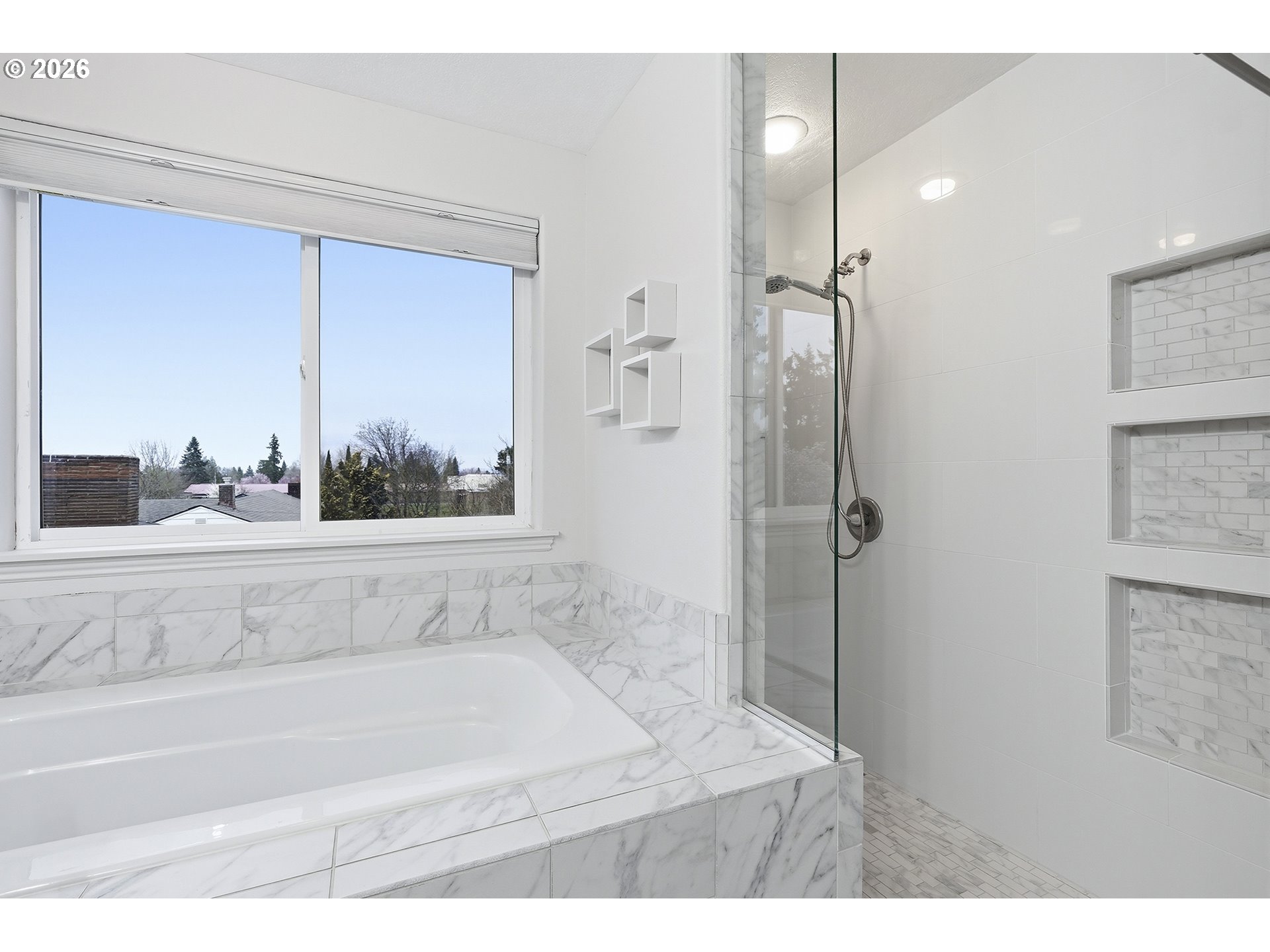 3307 North Terry Street Portland, OR 97217 - Photo 26 of 37 a bathroom with a bathtub and a shower