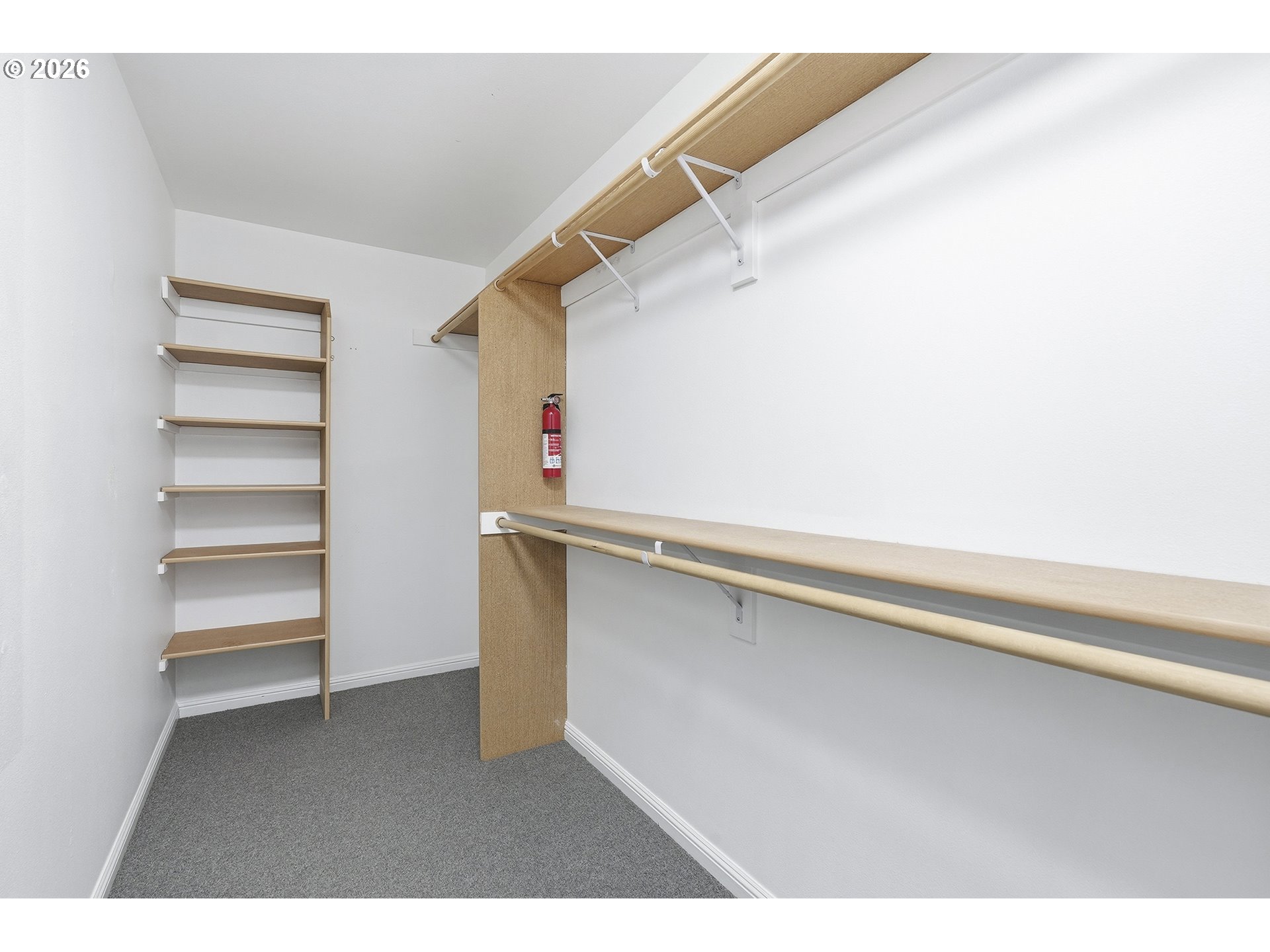 3307 North Terry Street Portland, OR 97217 - Photo 27 of 37 a view of walk in closet with empty racks