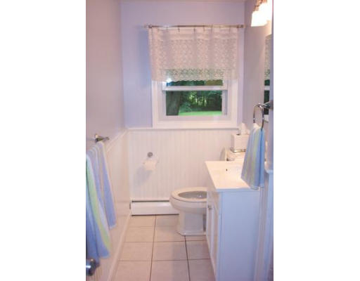 83 Old Stage Road Chelmsford, MA 01824 - Photo 8 of 8 a bathroom with a sink and a toilet