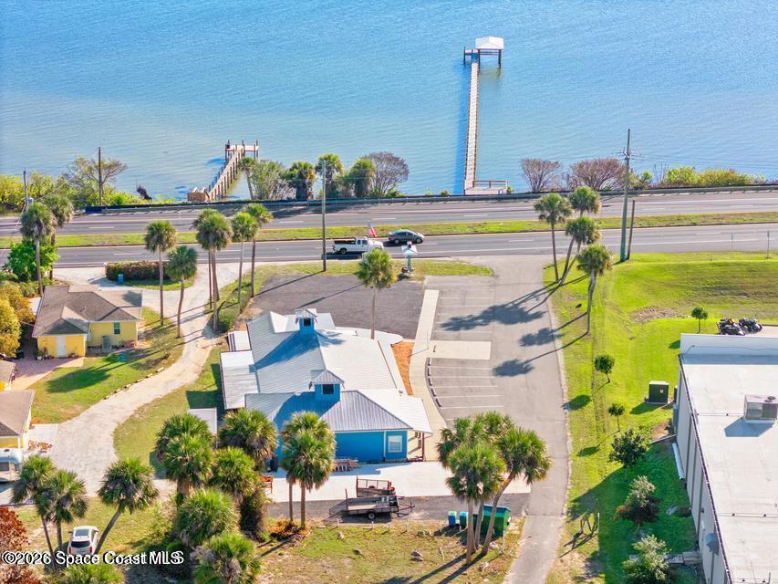 1280 Highway 1, Unit A Malabar, FL 32950 - Photo 15 of 26 a view of a city with an ocean and a building