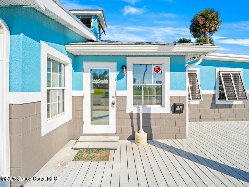 1280 Highway 1, Unit A Malabar, FL 32950 - Photo 2 of 26 a front view of a house with a porch