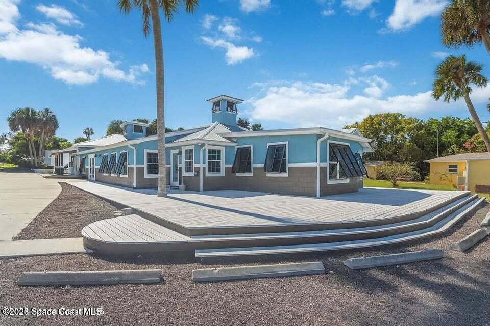 1280 Highway 1, Unit A Malabar, FL 32950 - Photo 3 of 20 a front view of a house with swimming pool