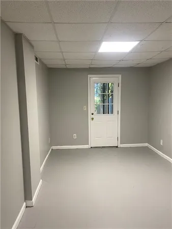 an empty room with windows