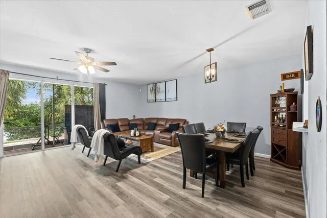 a work room with furniture and wooden floor