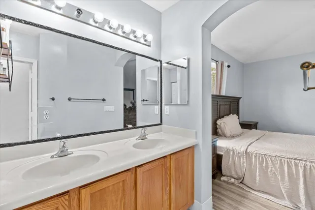 a bathroom with a sink and a mirror