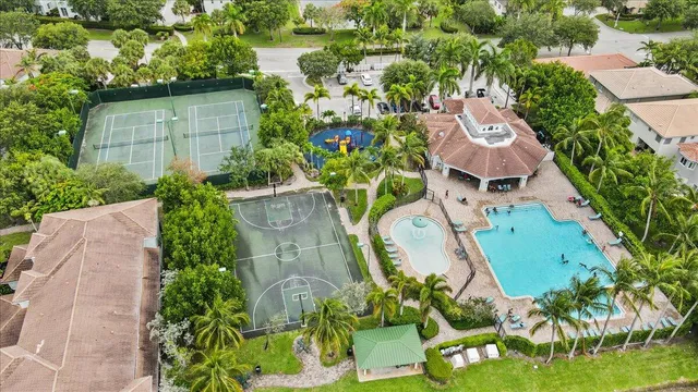 an aerial view of a house with a garden
