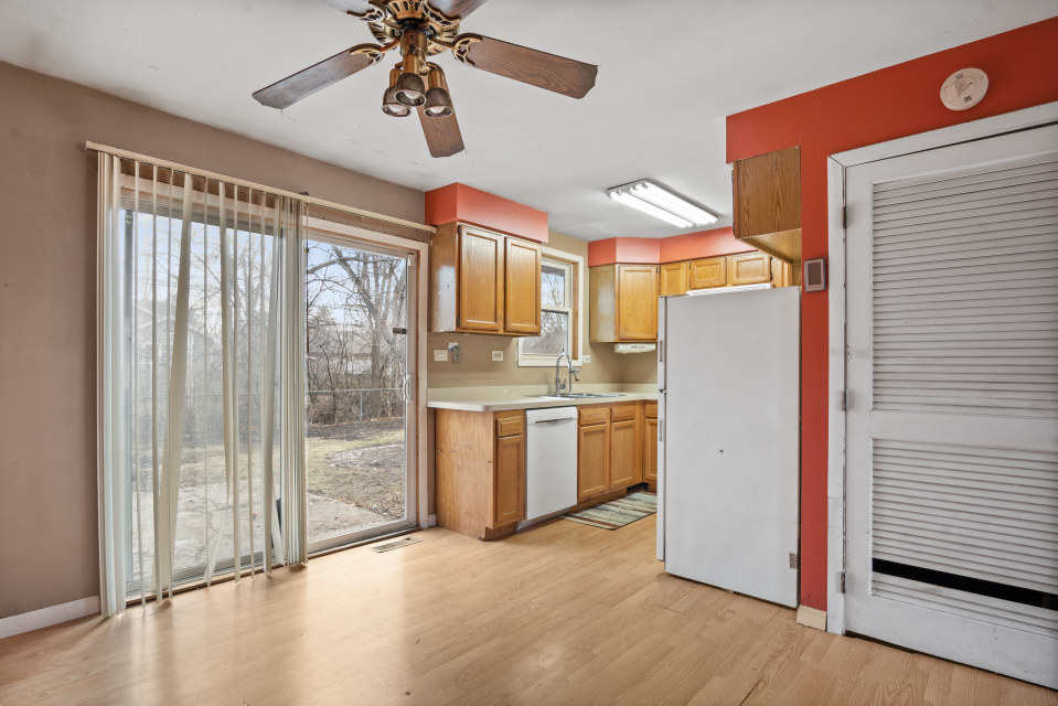 531 Silverleaf Boulevard Carol Stream, IL 60188 - Photo 12 of 25 a view of kitchen with stainless steel appliances granite countertop cabinets and a table
