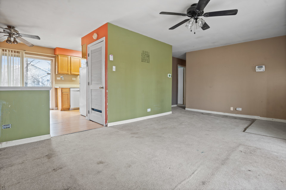 531 Silverleaf Boulevard Carol Stream, IL 60188 - Photo 9 of 25 a view of a room with a ceiling fan and window