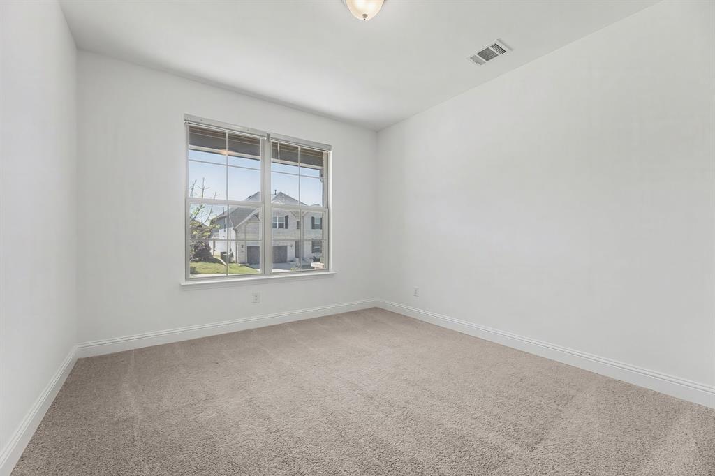 3120 Stonelake Ridge Lewisville, TX 75010 - Photo 21 of 40 a view of an empty room with a window