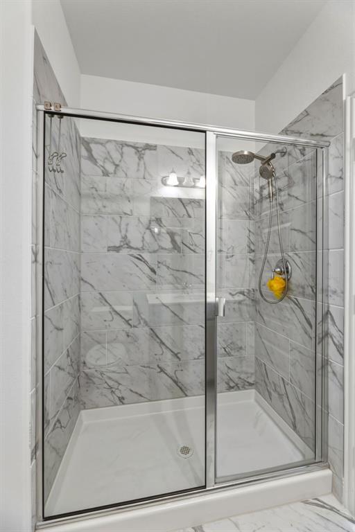 3120 Stonelake Ridge Lewisville, TX 75010 - Photo 29 of 40 a bathroom with a shower