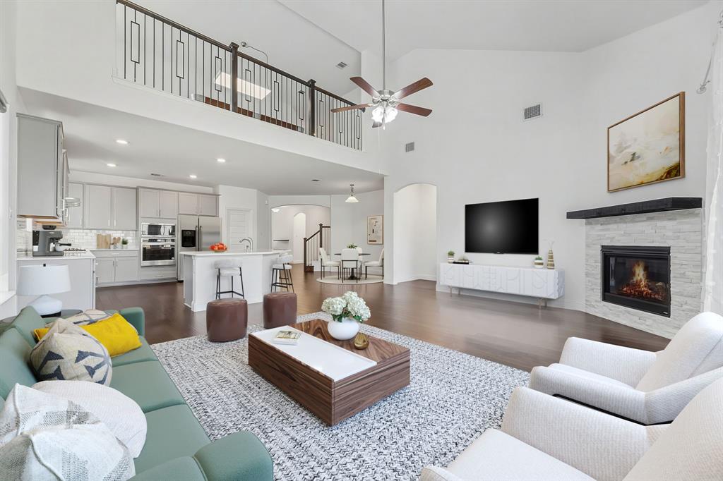 3120 Stonelake Ridge Lewisville, TX 75010 - Photo 5 of 40 a living room with furniture and a flat screen tv