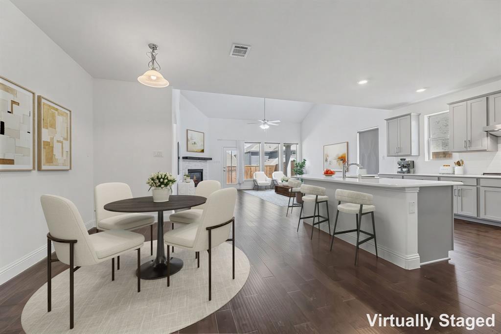 3120 Stonelake Ridge Lewisville, TX 75010 - Photo 9 of 40 a view of kitchen with cabinets table and chairs
