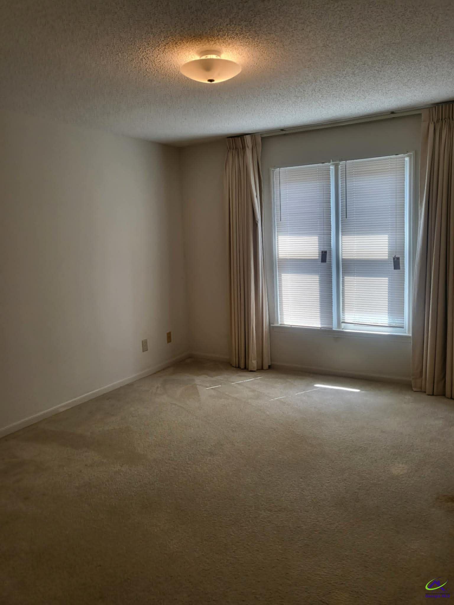 4472 Club Trace Macon, GA 31210 - Photo 10 of 10 an empty room with windows and closet