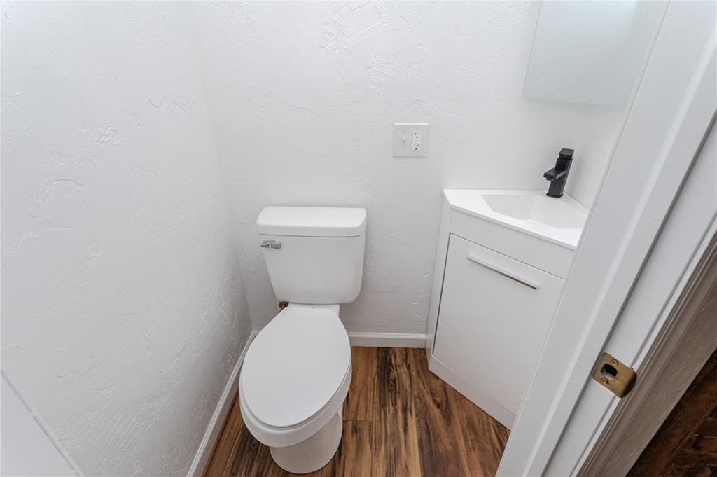 325 Laughlin Street Dawson, PA 15428 - Photo 19 of 34 a bathroom with a toilet and a sink