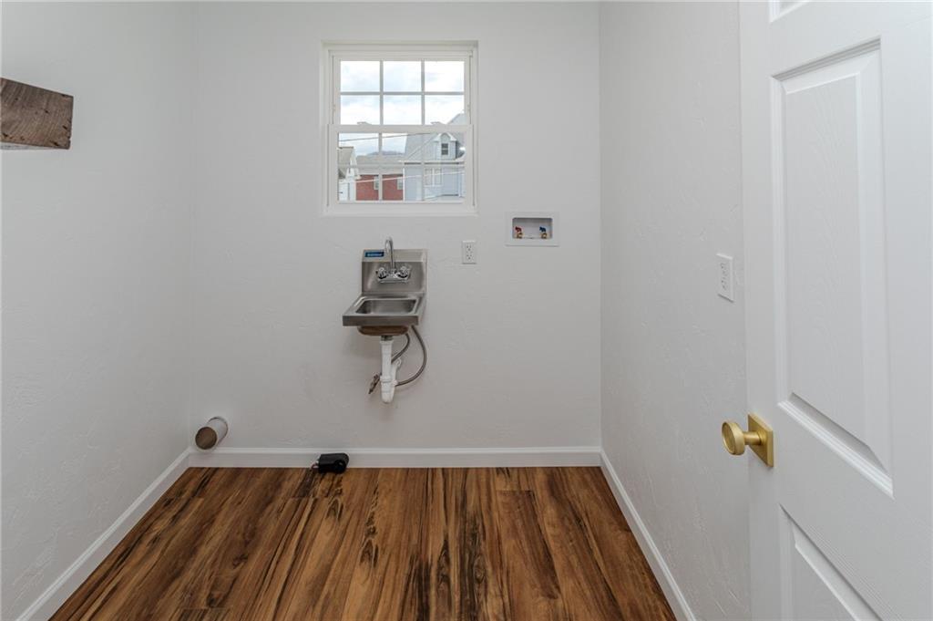 325 Laughlin Street Dawson, PA 15428 - Photo 22 of 34 a bathroom with a bathtub and shower