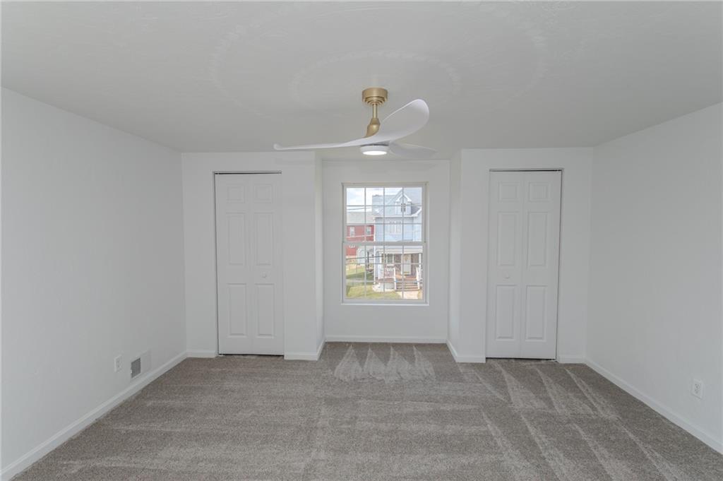 325 Laughlin Street Dawson, PA 15428 - Photo 26 of 34 a view of an empty room with a window