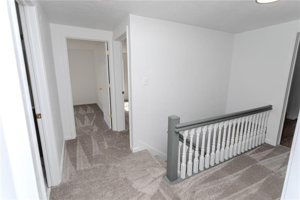 325 Laughlin Street Dawson, PA 15428 - Photo 28 of 34 a view of a hallway with entryway door