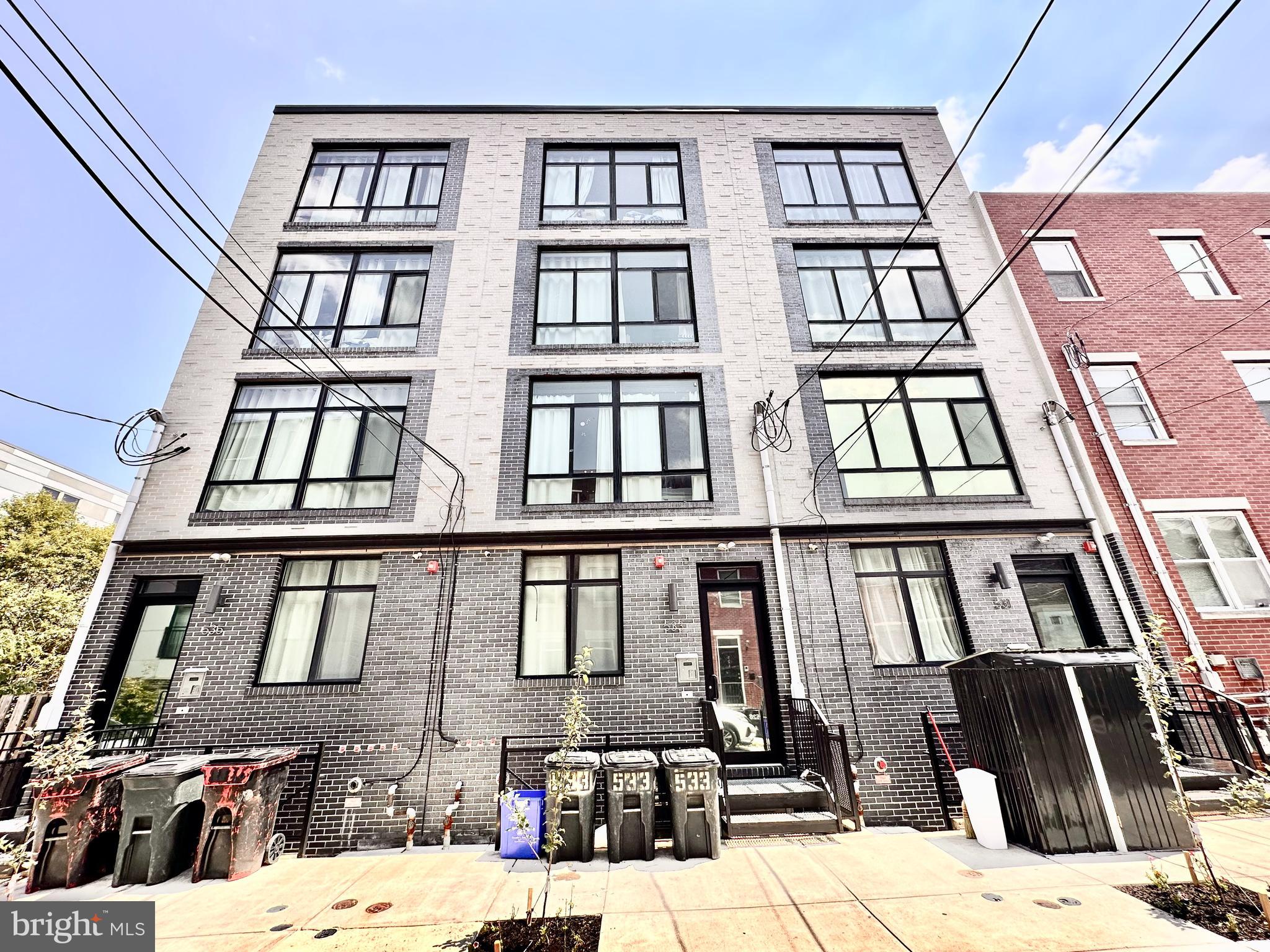 533 Budd Street, Unit 1O Philadelphia, PA 19104 - Photo 1 of 11 a view of a large building
