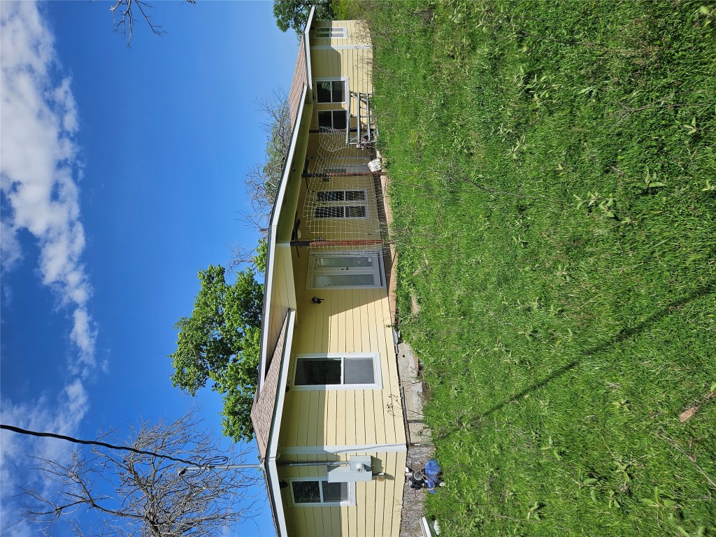 1988 Cr 116 Roads Rogers, TX 76569 - Photo 14 of 18 a view of a house with a yard
