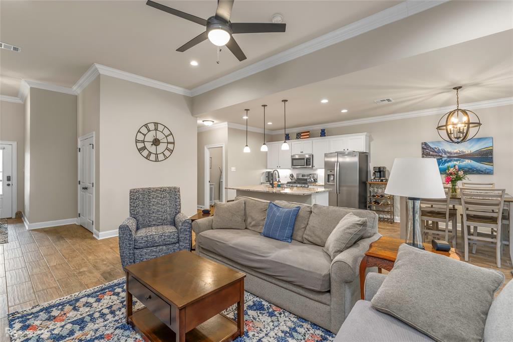 122 Brimestone Loop Benton, LA 71006 - Photo 11 of 33 a living room with furniture and kitchen view