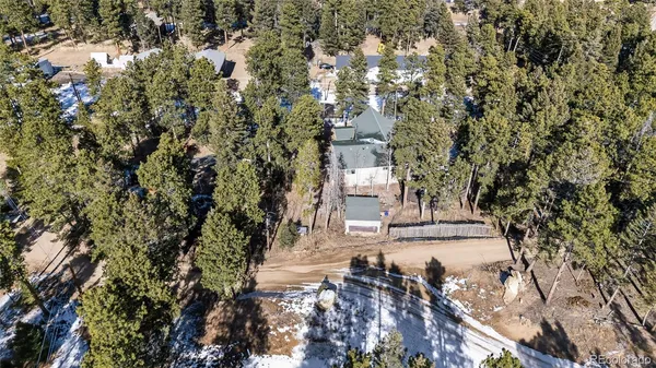 a view of a house with a tree