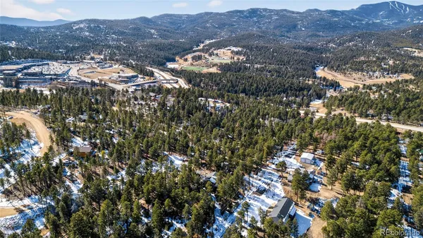 a view of mountains and valleys