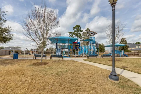 a view of a water with building in the background