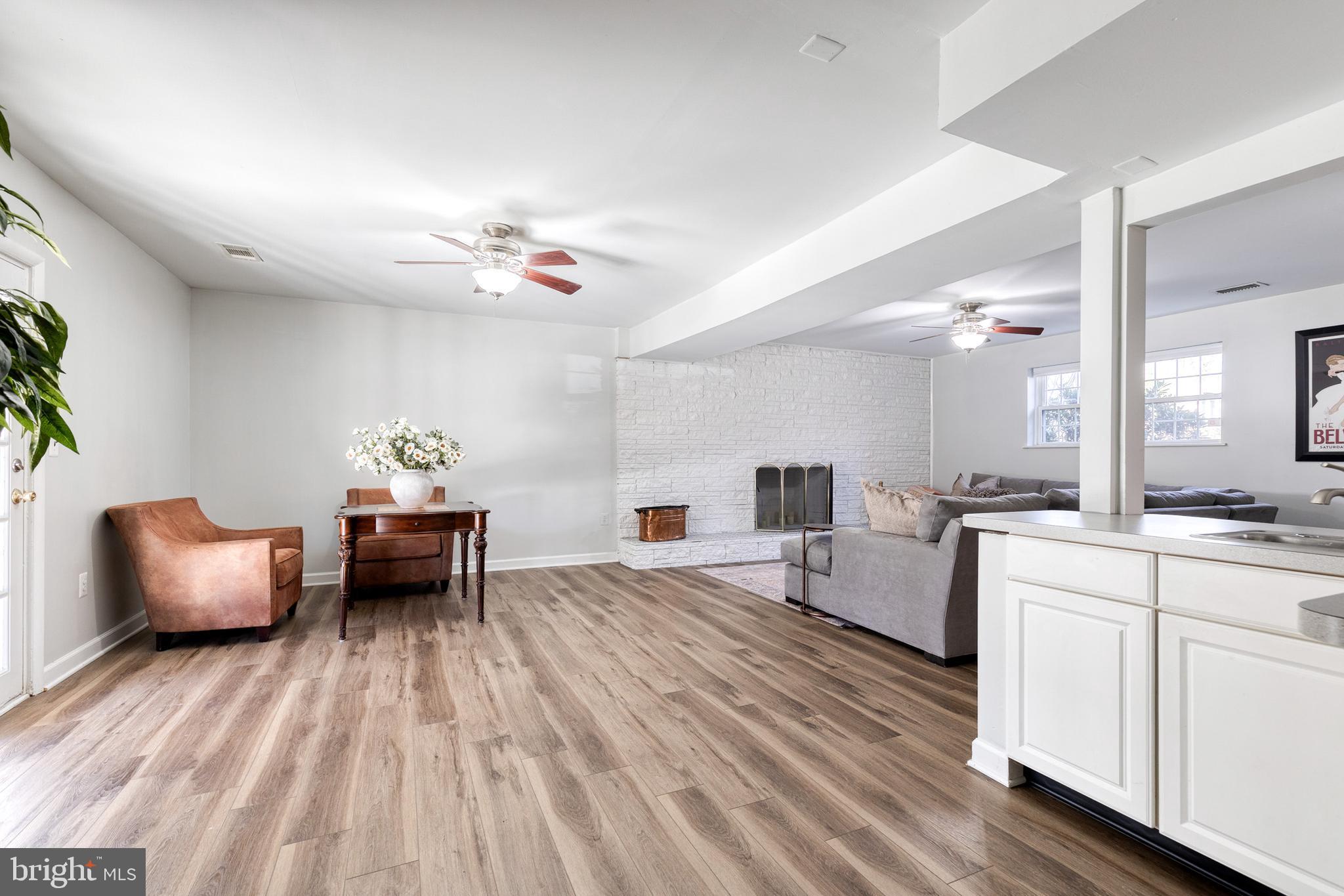 232 Cardamon Drive Edgewater, MD 21037 - Photo 26 of 44 a living room with furniture and wooden floor
