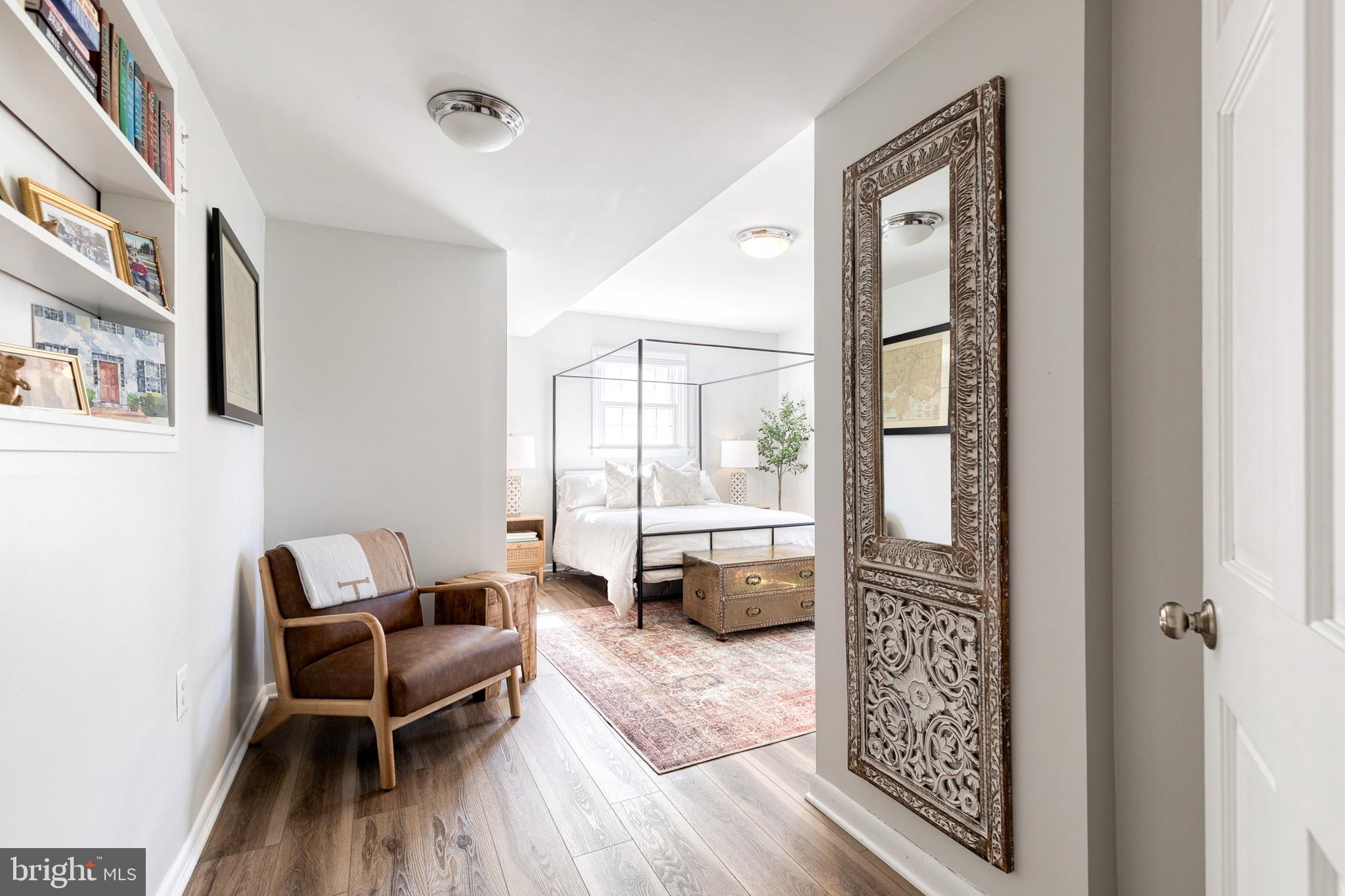 232 Cardamon Drive Edgewater, MD 21037 - Photo 29 of 44 a living room with furniture and a wooden floor