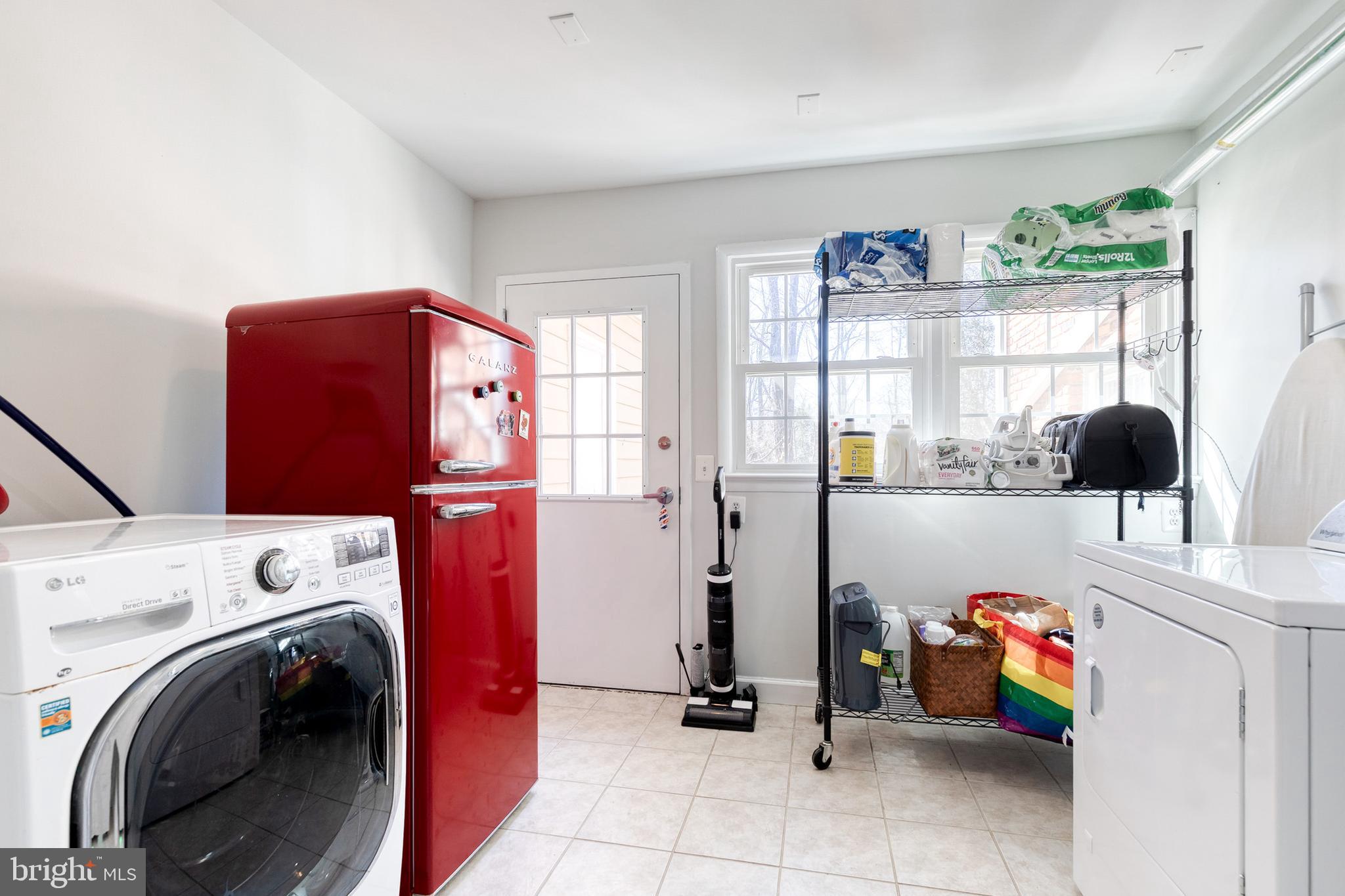 232 Cardamon Drive Edgewater, MD 21037 - Photo 33 of 44 a utility room with dryer and washer