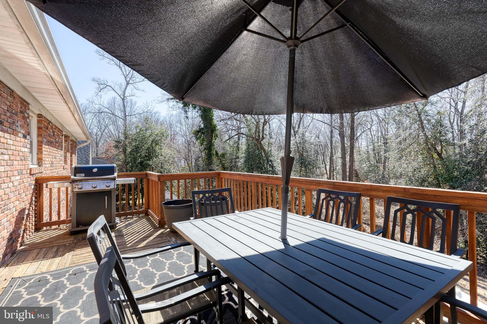 232 Cardamon Drive Edgewater, MD 21037 - Photo 34 of 44 a view of balcony with wooden floor and outdoor seating