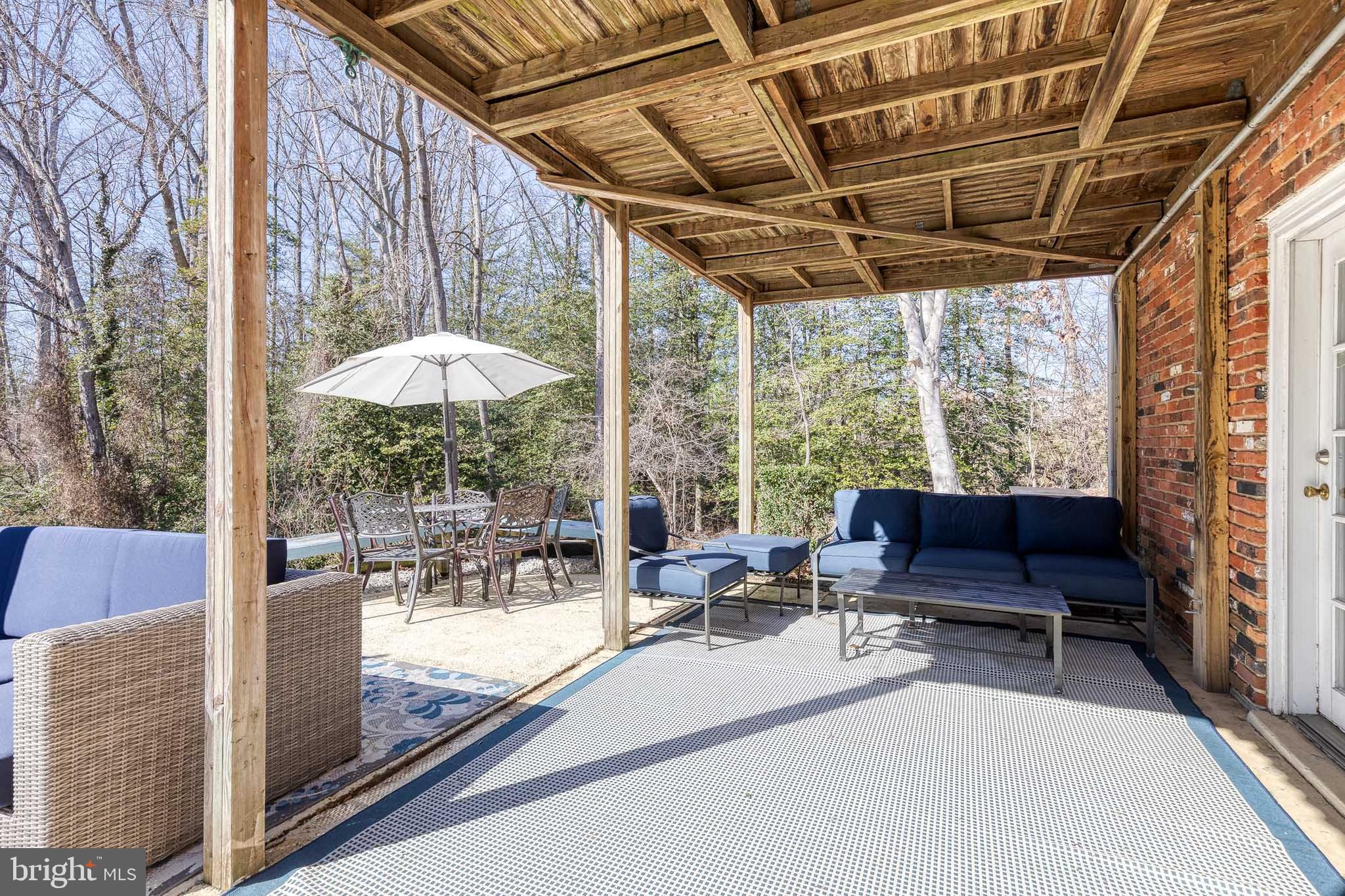 232 Cardamon Drive Edgewater, MD 21037 - Photo 38 of 44 a view of porch with a patio