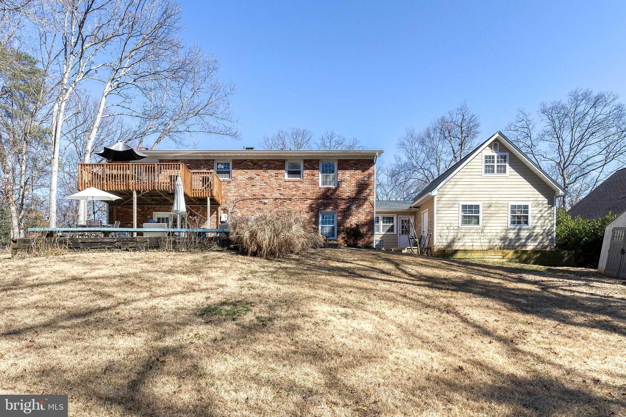 232 Cardamon Drive Edgewater, MD 21037 - Photo 41 of 44 a front view of a house with a yard