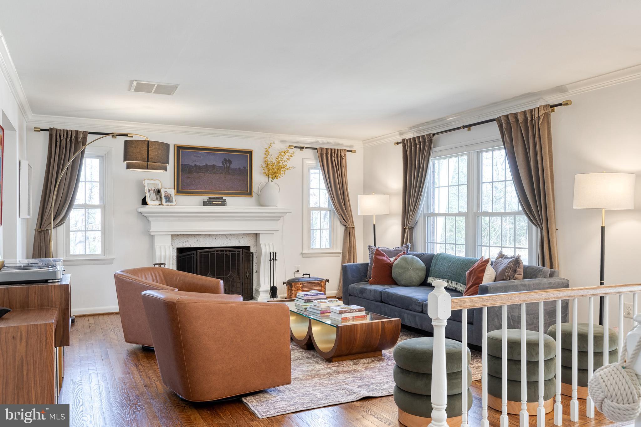 232 Cardamon Drive Edgewater, MD 21037 - Photo 8 of 44 a living room with furniture fireplace and a large window