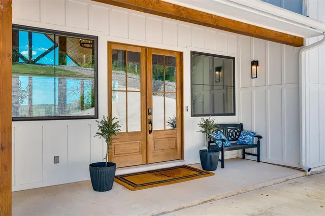 a front view of a house with patio