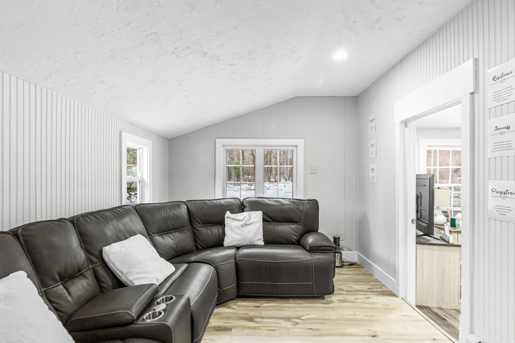 63 South Cottage Road Holland, MA 01521 - Photo 14 of 35 a living room with furniture and a window