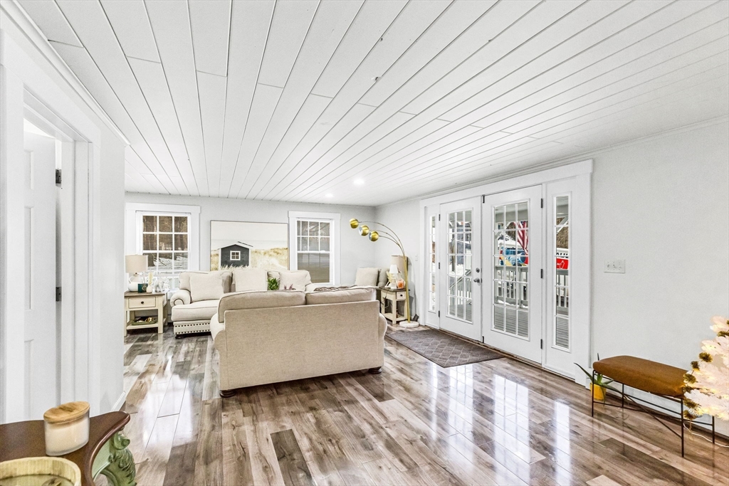63 South Cottage Road Holland, MA 01521 - Photo 6 of 35 a living room with furniture and a large window