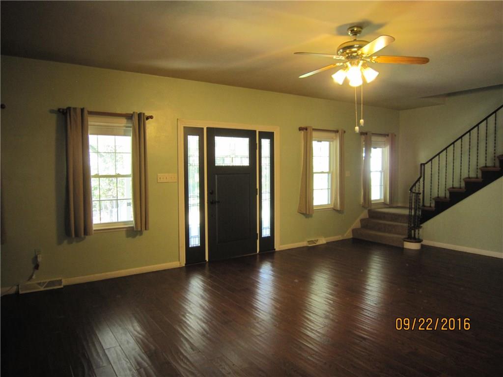 276 Mountain Road Uniontown, PA 15401 - Photo 6 of 25 OAK HARDWOOD FLOORS, ROD IRON RAILING AND HARDWOOD STEPS