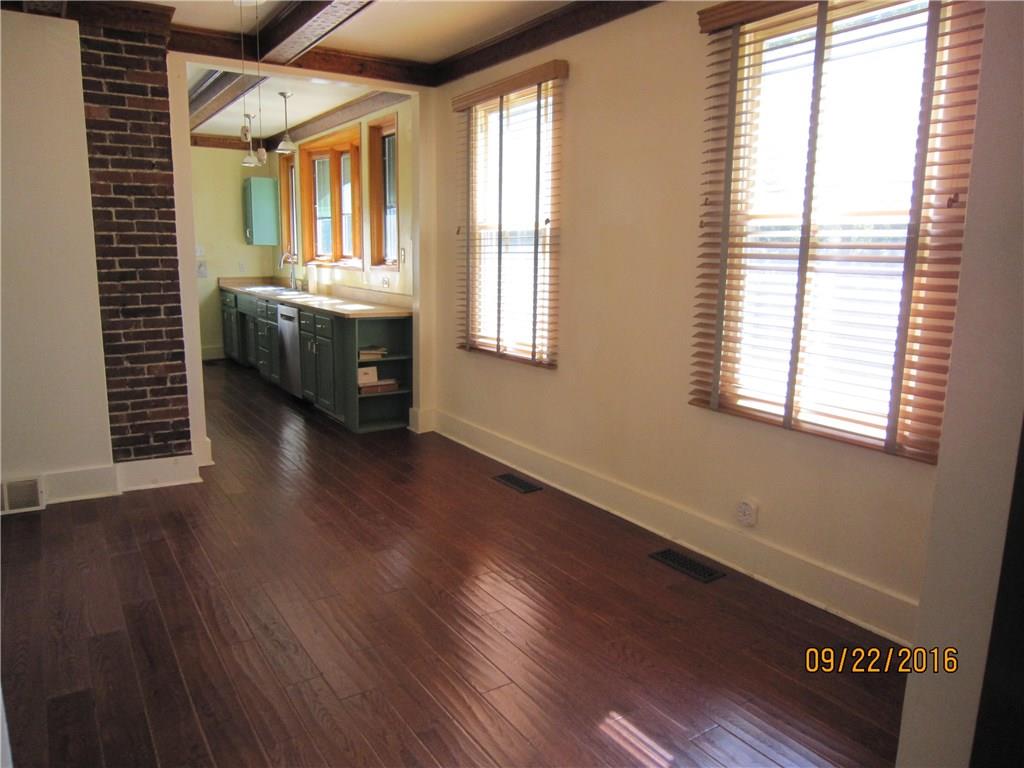 276 Mountain Road Uniontown, PA 15401 - Photo 8 of 25 BREAKFAST ROOM-OAK HARDWOOD FLOORS, HANDMADE WOOD BEAMS