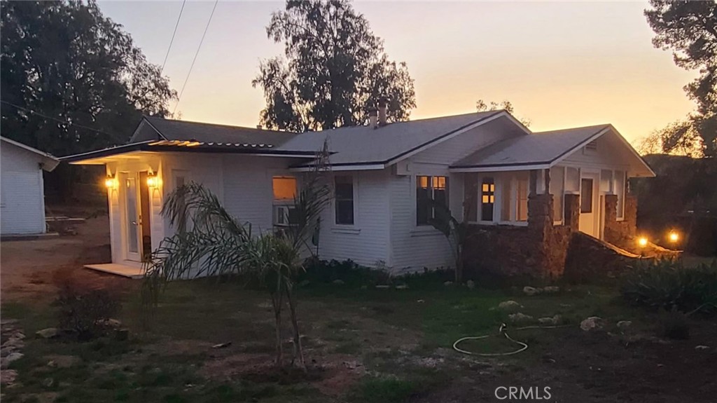 10560 Robinson Avenue Riverside, CA 92505 - Photo 2 of 11 a view of a house with a yard