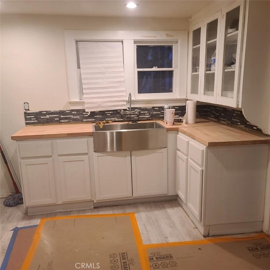 10560 Robinson Avenue Riverside, CA 92505 - Photo 3 of 11 a kitchen with a stove and a sink